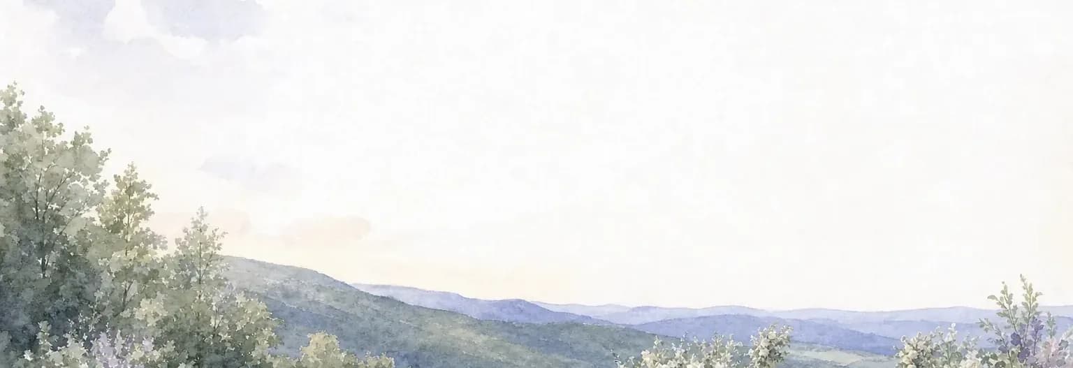 Watercolour of a wide open lawn on a Catskill ridge in late afternoon light, flowering shrubs along its edge and layered blue hills falling away beyond.